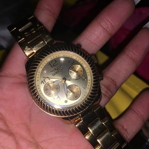 Gold women’s watch invicta